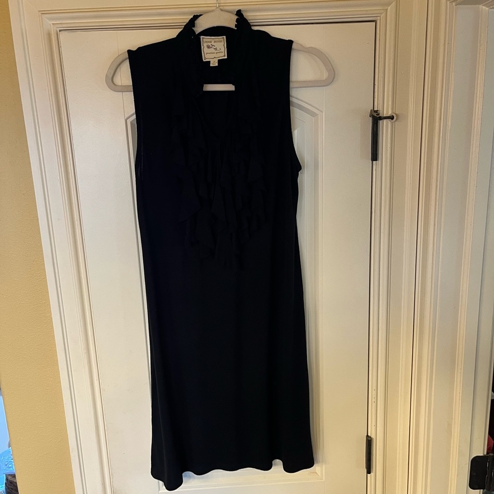 Black sleeveless dress with ruffle detail